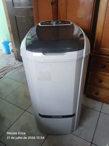 Maquina de lavar e guarda roupa