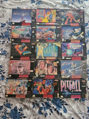 Cartuchos originais na caixa super nintendo