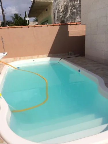 casa com piscina litoral peruibe, baixa,média,pré e alta temporada ,perto da praia.