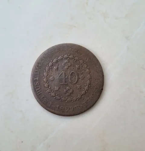 Moedas raras de 40 e 20 reis bronze.