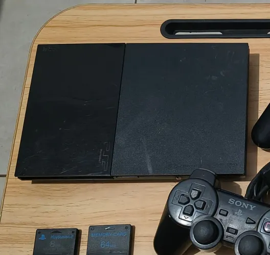 Playstation 2 Slim + 2 controles + controle remoto + 2 memory cards- funcionando