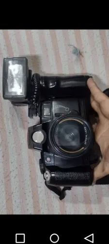 Camera analógico funcionando com tripé