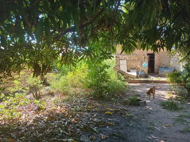 Vende-se terreno com casa