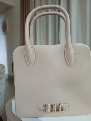 Bolsa beje Santa Lolla de mão 
