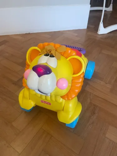 Leão andador Fisher Price