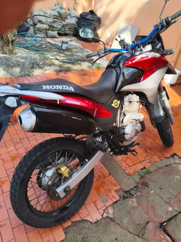Vendo ou troco vela fina moto e zera