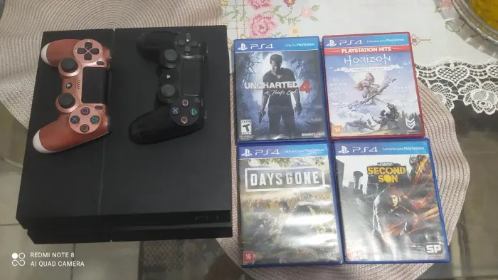 PS4 FAT 500gb com 2 controles originais e 4 jogos bons.