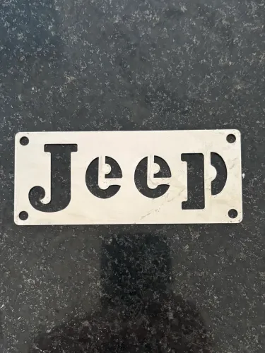 Vende-se plaqueta de Inox Jeep