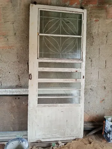 Porta de ferro com vidro correr