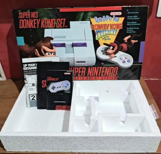 Caixa +Berço + manuais + pôster Super Nintendo 