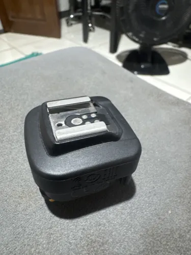 Adaptador para flash cânon