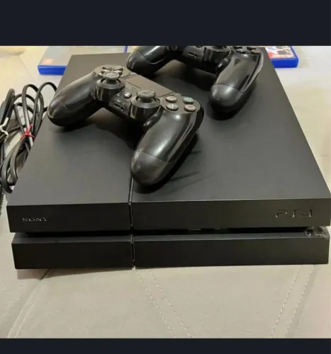 Ps4 2 controles vendo ou troco 