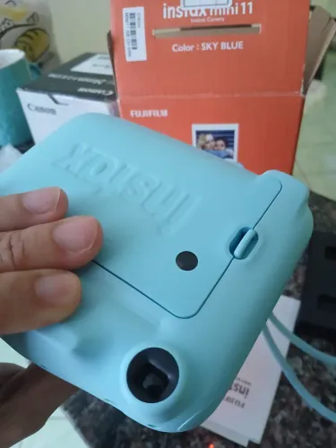Instax mine 11 perfeita 500,00