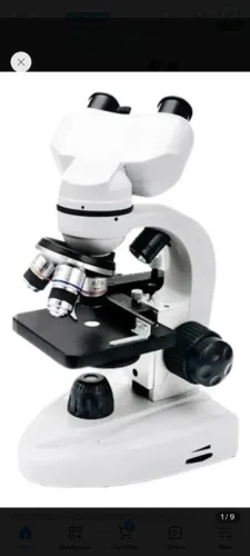Microscopio binocular