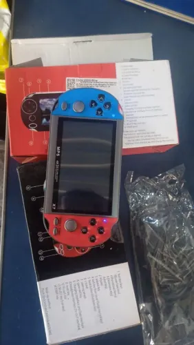 Mini gamer similar ao psvita com muitos jogos de Flip super Nintendo game boy e etc 