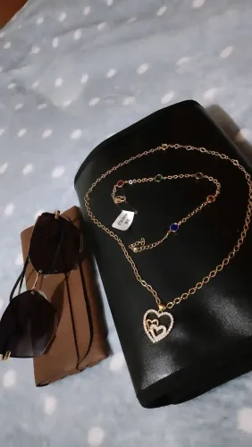 Vendo esse cordão e pulseira magold e óculos de marca também novo