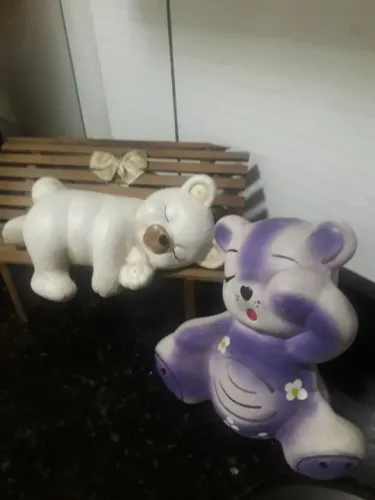 Urso polar de gesso  com banco de mamadeiras