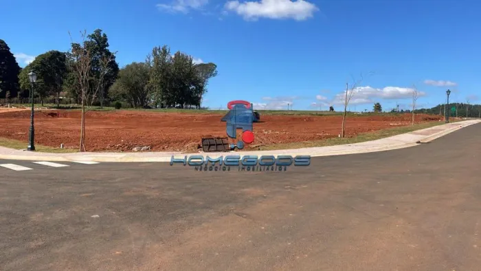 Terreno de esquina à venda com 2.640 m², frente para para mata, topografia ideal para cons