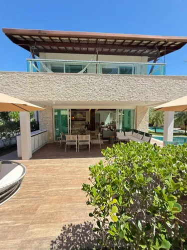 Casa à Venda no Condomínio Narguilé  Pé na Areia com Luxo e Exclusividade!
