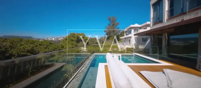 Casa de condomínio com vista para o verde, moderna e sustentável com 4 quartos sendo 3 suí