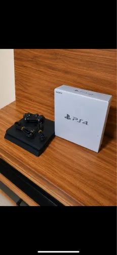 Vendo PS4 fat novo com caixa