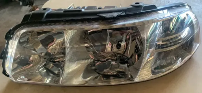 Farol Gol G3 lado esquerdo cromado 