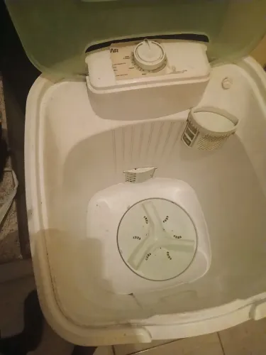 Vendo um tanquinho com defeito