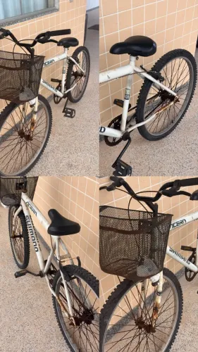 Bicicleta antiga com cestinha - precisa revisão
