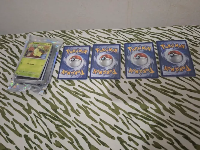 Cartas pokemom + 1 carta promocional e 4 hits garantidos