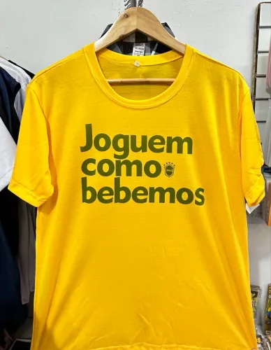 Camiseta Amarela Joguem como Bebemos