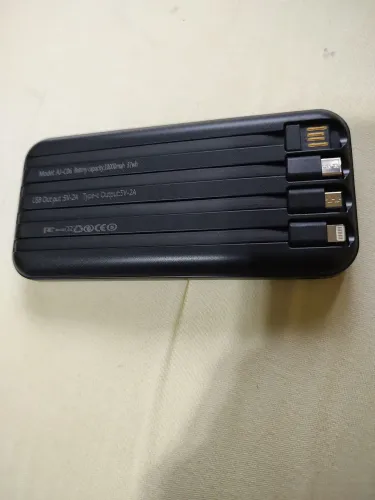 Vendo carregador de celular portátil com 4 linhas novo na caixa 