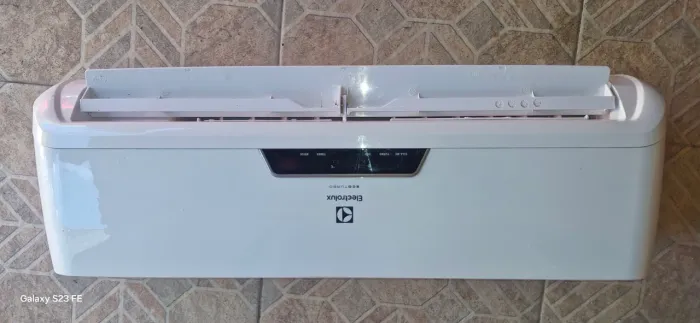 Vendo ar condicionado funcionando perfeitamente 
