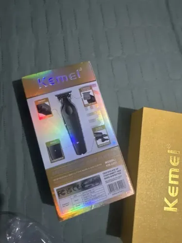 Máquina de corte Kemei para acabamento com carregador USB KM-2299 Ultimas peças