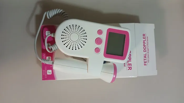 Bomba de tirar leite e aparelho de ouvir o coração do bebe