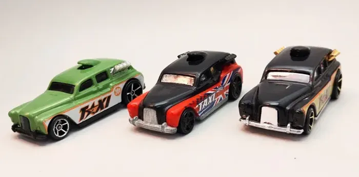 Miniaturas Hotwheels - 3 unidades *Taxi Cockney Cab* Esc 1:64