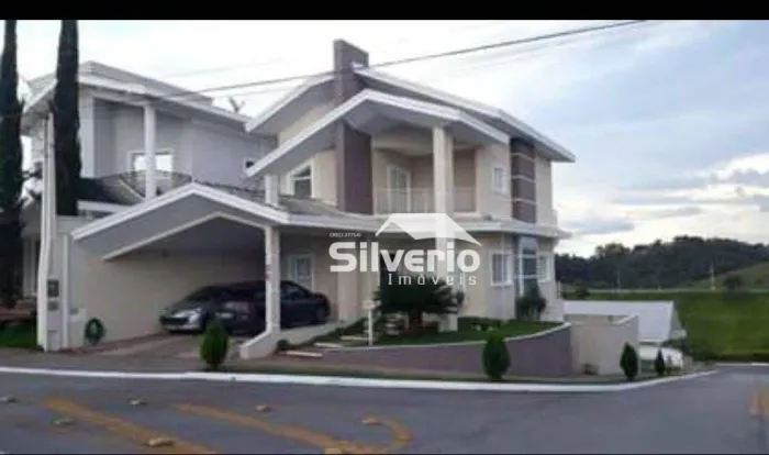 Sobrado com 3 dormitórios à venda, 230 m² por R$ 1.400.000,00 - Condomínio Residencial Man