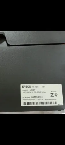 Impressora de nota fiscal modelo Epson e um eleitor de código de barras modelo Elgin 