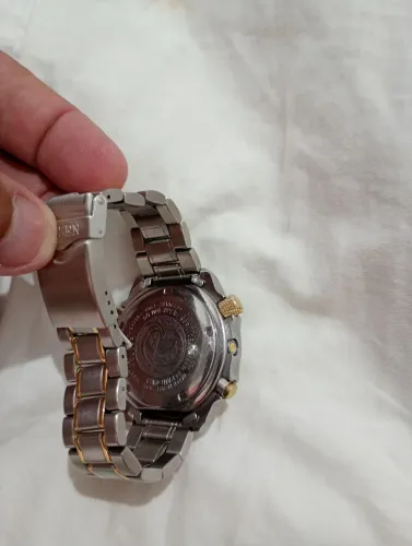Relógio Citizen c 506 carbon série ouro.