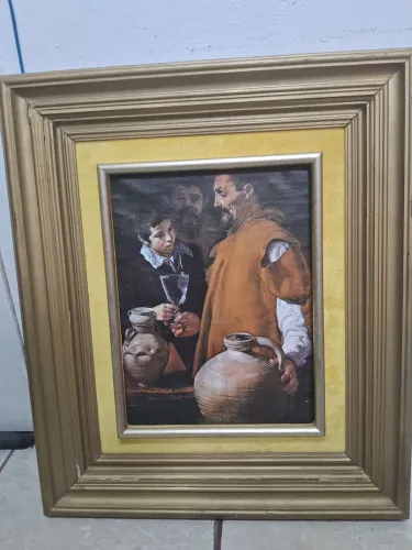 reprodução emoldurada da obra O Aguadeiro de Sevilha