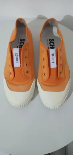 Tênis Schutz ( modelo: Smash) cor: Laranja ( lona) Tam.37. Usado.