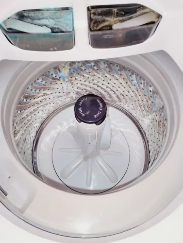 Máquina de lavar com defeito