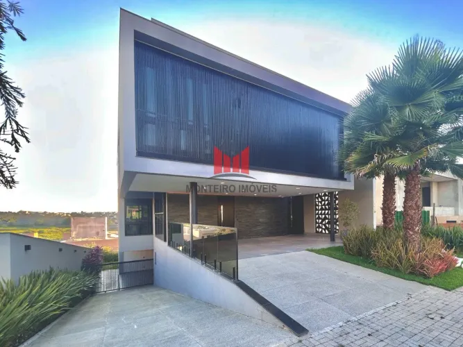 Excelente Casa Moderna em Condomínio localizada no Bairro Alphaville Vespasiano, com 3 dor
