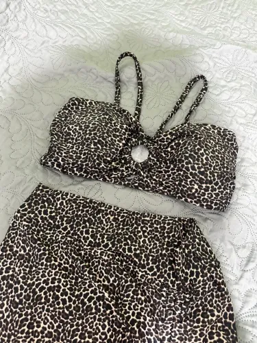 Conjunto top e saia de onça M