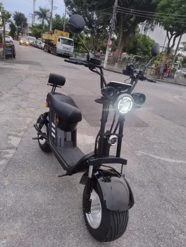 Moto muito nova,5 meses de uso,alarme integrado,som , auto falante,.