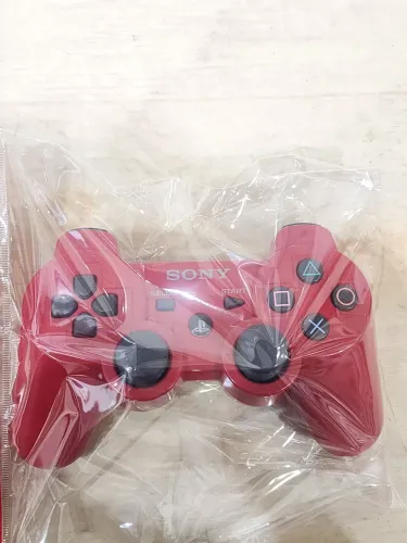 Controle de ps3 original seminovo na cor vermelha