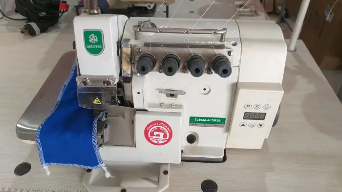 Máquina de costura overlock cadeia zoje industrial  direcdriw 