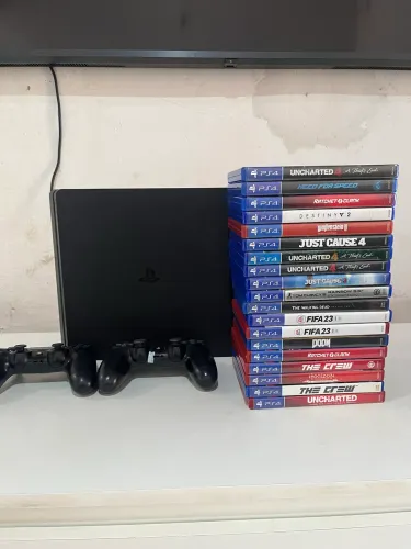 Ps4 Slim 2 controles lacrados e 1 jogo