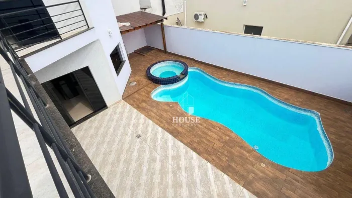 Sobrado com 3 dormitórios para alugar, 270 m² por R$ 6.352,00/mês - Residencial Village da