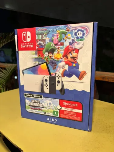 Nintendo Switch Oled 64gb Mario Wonder Lacarado novo leia a descrição