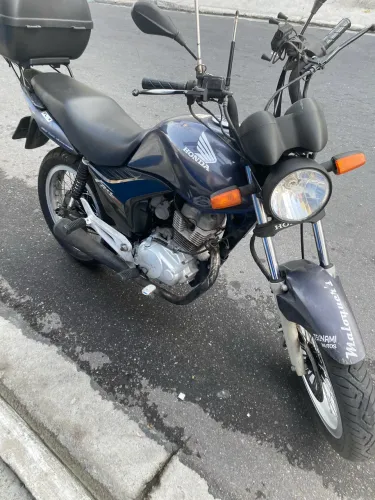 Vendo fan mix moto único do dono Manoal e chave reserva moto toda em dia só pega e andar